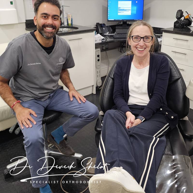 A real adult patient in the treatment room with Dr Dev Orthodontics