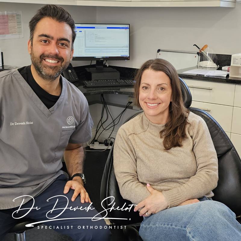 Dr Devesh Shelat with a real patient at his specialist orthodontic practice